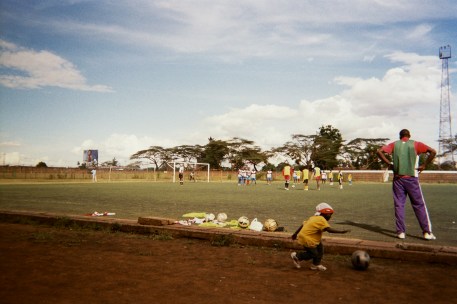 Playing football at a Kenyan academy with Emmanuel.